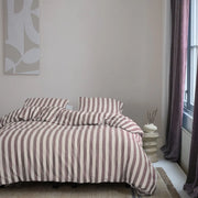 full bed: Elias cream cotton flannel duvet cover with burgundy stripes, styled on a bed with matching pillows